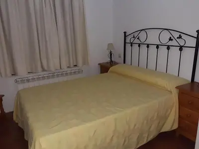 Cama o camas de una habitación en Casa Rural Rio Canto