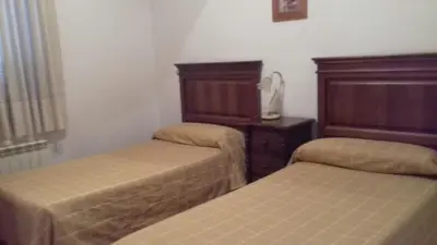 Cama o camas de una habitación en Casa Rural Rio Canto