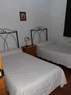 Cama o camas de una habitación en Casa Rural Rio Canto