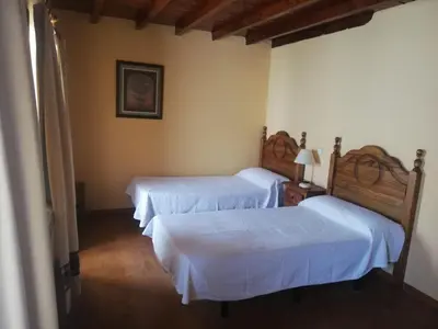Cama o camas de una habitación en Casa Rural del Chopo