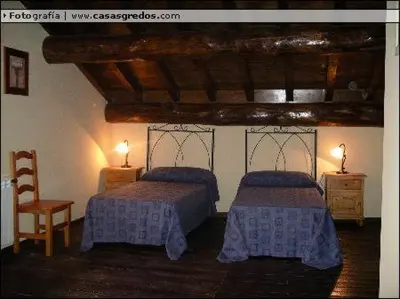 Cama o camas de una habitación en Casa Rural la Cancha I