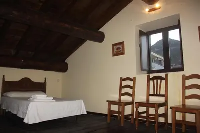 Cama o camas de una habitación en Casa Rural la Cancha I