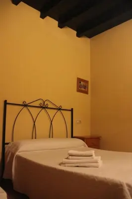 Cama o camas de una habitación en Casa Rural la Cancha I