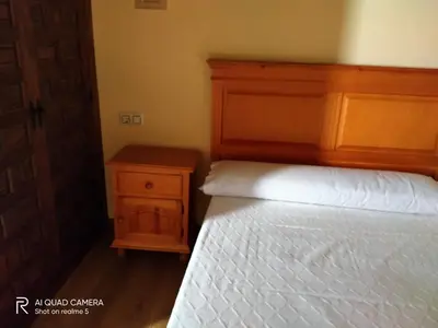 Cama o camas de una habitación en Casa Rural la Cancha II
