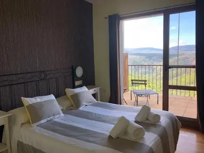 Cama o camas de una habitación en Hotel Rural Porta Coeli - Dehesa Santa Lucía