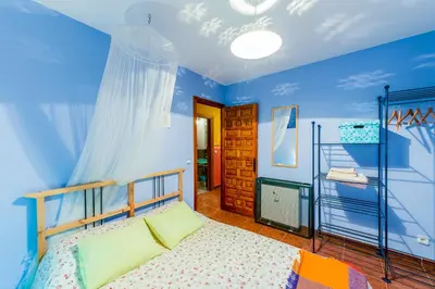 Cama o camas de una habitación en Casa Rural Valle del Arrago