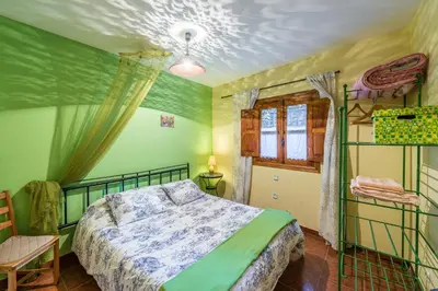 Cama o camas de una habitación en Casa Rural Valle del Arrago