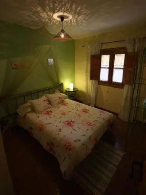 Cama o camas de una habitación en Casa Rural Valle del Arrago