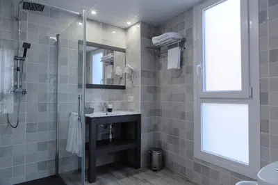 Un baño de Hotel Apartamentos MPD