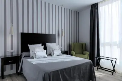 Cama o camas de una habitación en Hotel Apartamentos MPD