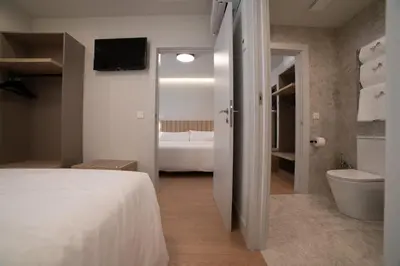 Cama o camas de una habitación en Yoanna Hotel