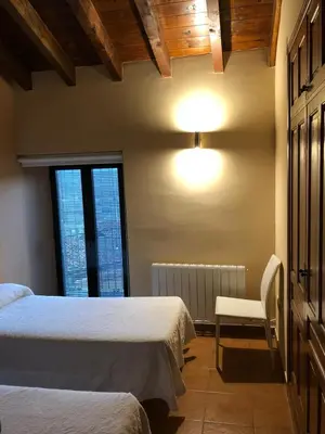 Cama o camas de una habitación en Casa Rural Fuente la Bolera