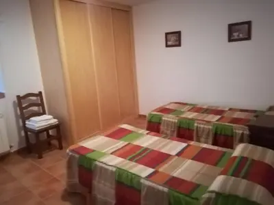 Cama o camas de una habitación en Casa Rural Valdecorneja