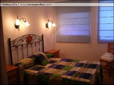 Cama o camas de una habitación en Casa Rural Valdecorneja