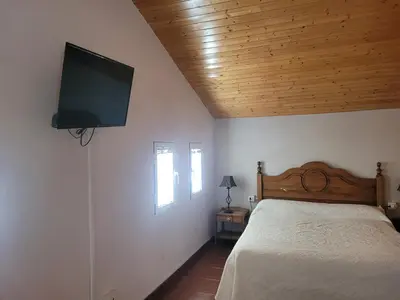 Cama o camas de una habitación en Casa Rural Los Riscos de Gredos