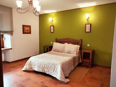 Cama o camas de una habitación en Casa Rural El Robledo