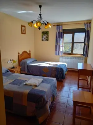 Cama o camas de una habitación en Casa Rural La Cerra