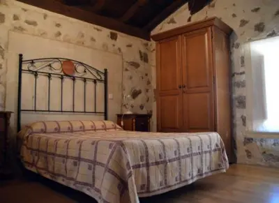 Cama o camas de una habitación en Casa Rural El Molino I