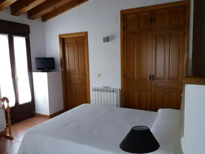 Cama o camas de una habitación en Casa Rural La Antigua Fragua