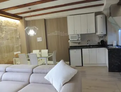Una cocina o zona de cocina en Apartamento Ribera Del Puente