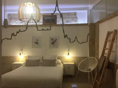 Cama o camas de una habitación en Apartamento Ribera Del Puente