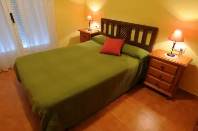 Cama o camas de una habitación en El Taller