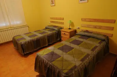 Cama o camas de una habitación en El Taller