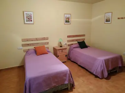 Cama o camas de una habitación en El Taller