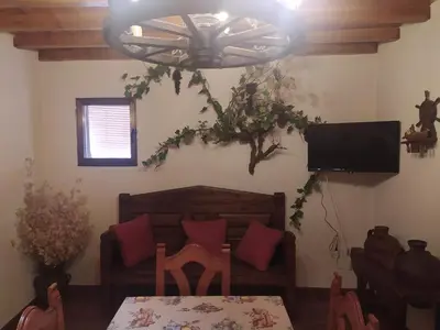 Una televisión o centro de entretenimiento en Casa Lopez