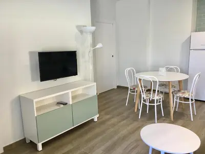 Una televisión o centro de entretenimiento en AT SAN MIGUEL o
