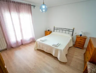 Cama o camas de una habitación en AT SAN MIGUEL o