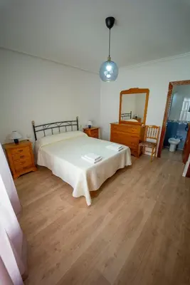 Cama o camas de una habitación en AT SAN MIGUEL o