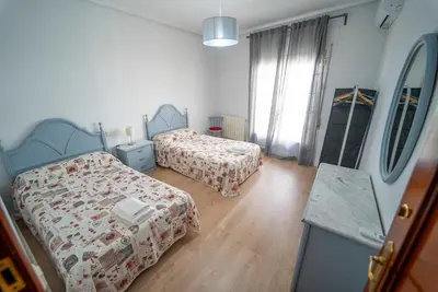 Cama o camas de una habitación en AT SAN MIGUEL o