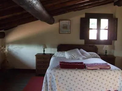 Cama o camas de una habitación en Casas rurales Caño Chico y La Fuente