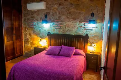 Cama o camas de una habitación en Apartamentos Rurales Tierras de Granadilla