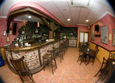 El salón o zona de bar de Hotel Rural El Arriero