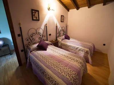 Cama o camas de una habitación en Casa Rural Apartamento Las Malpicas