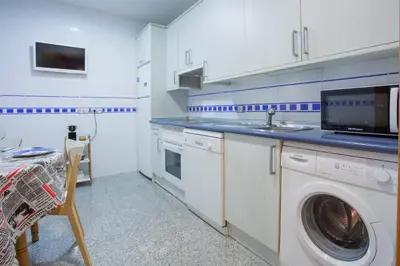 Una cocina o zona de cocina en APARTAMENTOS ABULA