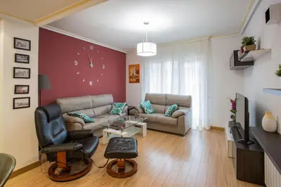 Zona de estar de APARTAMENTOS ABULA