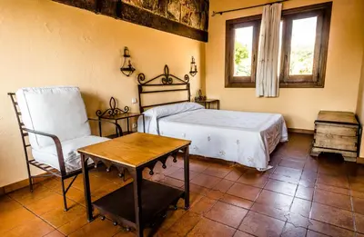 Cama o camas de una habitación en Hotel Rural Hosteria Fontivieja TR-CC-195