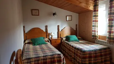 Cama o camas de una habitación en La Puente 9 de Gredos
