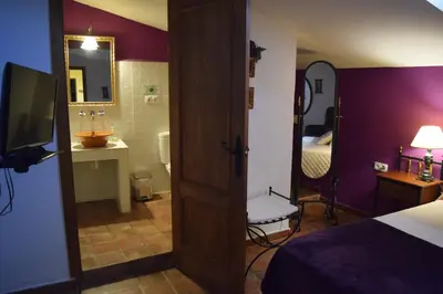 Cama o camas de una habitación en Hotel Casa Rural Don Álvaro de Luna