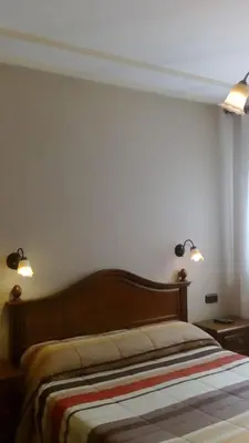 Cama o camas de una habitación en Hostal Granada