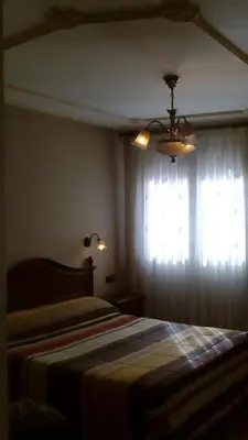 Cama o camas de una habitación en Hostal Granada