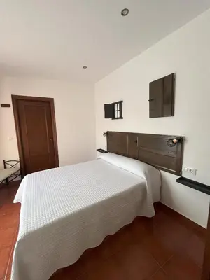 Cama o camas de una habitación en Casa rural las pelliquerinas