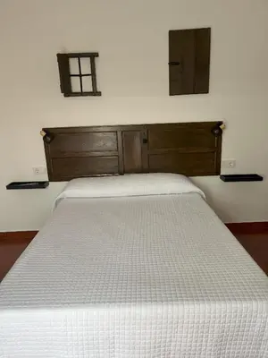 Cama o camas de una habitación en Casa rural las pelliquerinas
