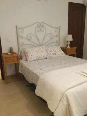 Cama o camas de una habitación en Apartamentos Andrada