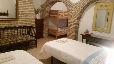 Cama o camas de una habitación en Apartamentos Andrada
