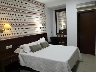 Cama o camas de una habitación en Hospedium Hotel Veracruz