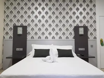 Cama o camas de una habitación en Hospedium Hotel Veracruz